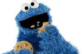 El simpàtic monstre de les galetes menjant unes galetes